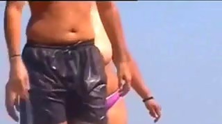 Thick Woman Wth Big Tits At A Beach